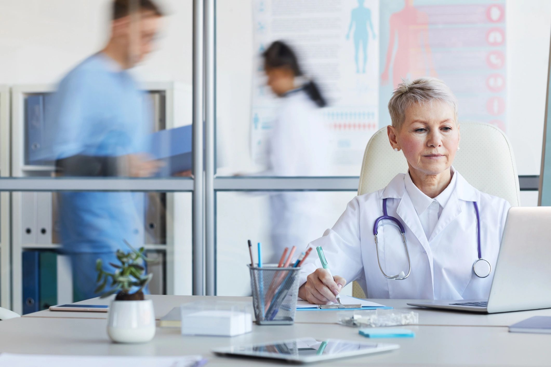 Senior healthcare leader working in an office environment