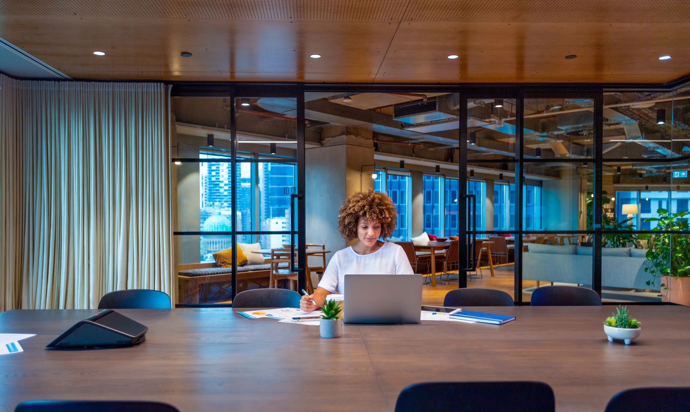 Entrepreneur working on launch planning in a modern office