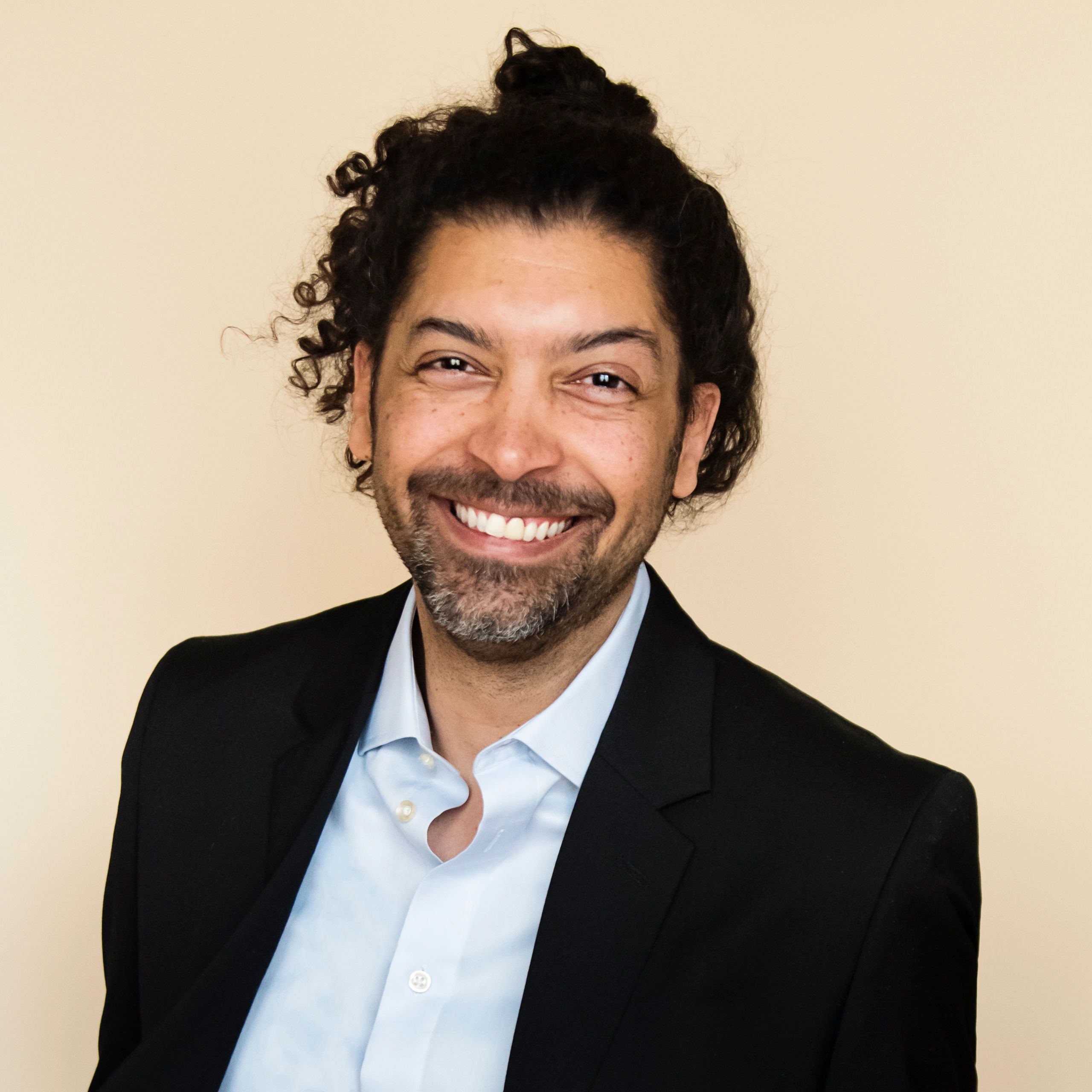 Professional portrait representing executive leadership