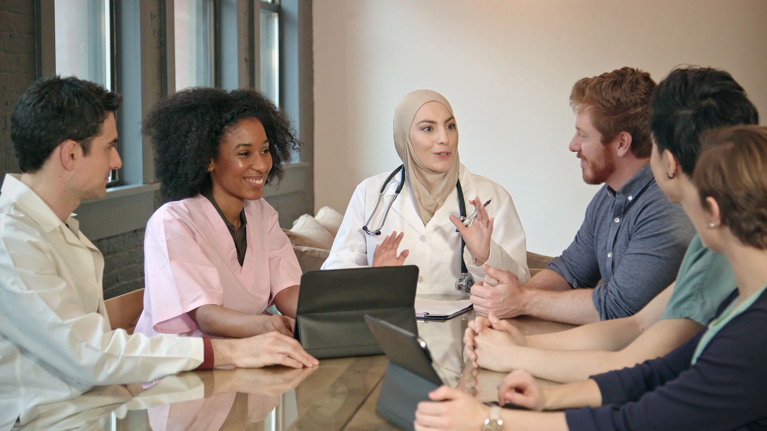 Healthcare professionals collaborating in a meeting